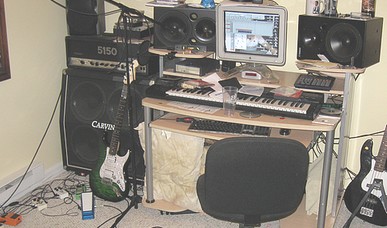Erik writing music in his studio