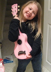 Girl playing a Ukulele